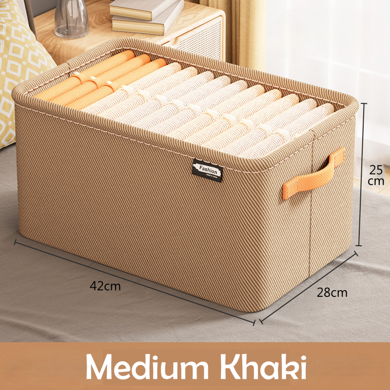 A clothing box organizer in a khaki color with visible side handles and a fabric build.