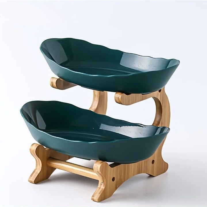 A set of multi-tiered snack bowls with a wood stand, available in beige, white, and turquoise colors, filled with various fruits.