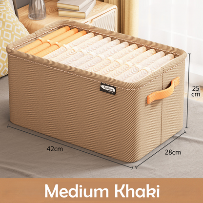 A clothing box organizer in a khaki color with visible side handles and a fabric build.