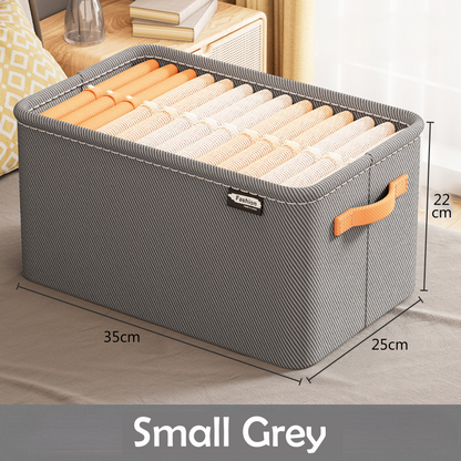 A clothing box organizer in a khaki color with visible side handles and a fabric build.