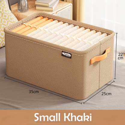 A clothing box organizer in a khaki color with visible side handles and a fabric build.