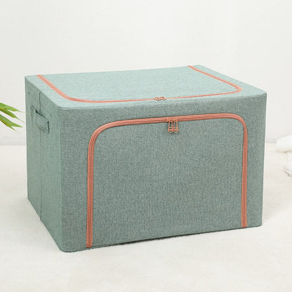 Foldable storage boxes in gray color with a side window, containing neatly folded multicolored items. The upper box is closed with a zipper, and the lower one is open, showing the items inside.
