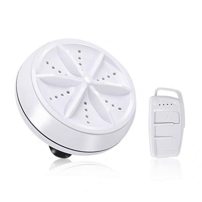 A compact white ultrasonic cleaner device with a star-shaped top and a small white remote control.