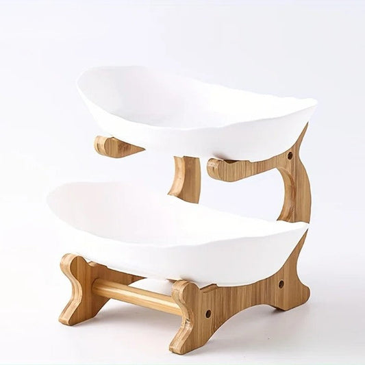 A set of multi-tiered snack bowls with a wood stand, available in beige, white, and turquoise colors, filled with various fruits.